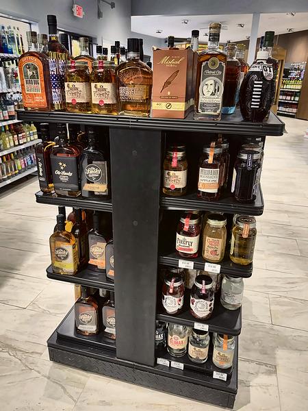 Island display of bourbon and whiskey bottles