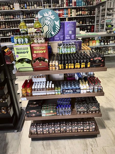 Display of mini bottles, shooters and liqueur packs near the counter