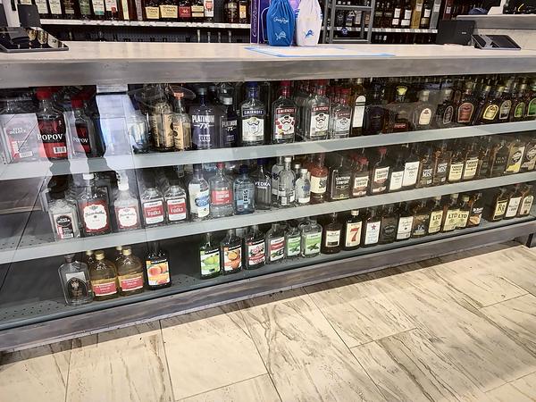 Long glass counter case of spirits