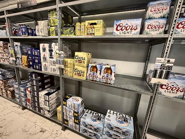 Light beer and seltzer cases on the shelves